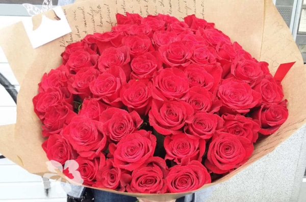 A bouquet of 51 long red roses